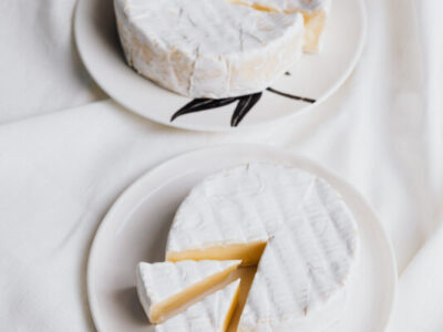 A camembert cheese on ceramic plates