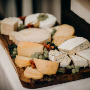 Assorted cheese on a wooden platter